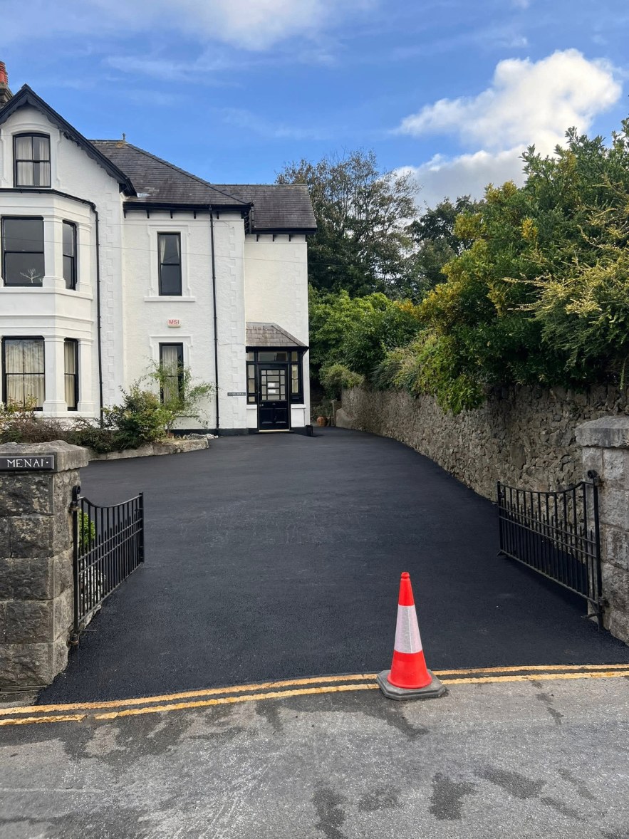 Asphalt driveway after professional repair